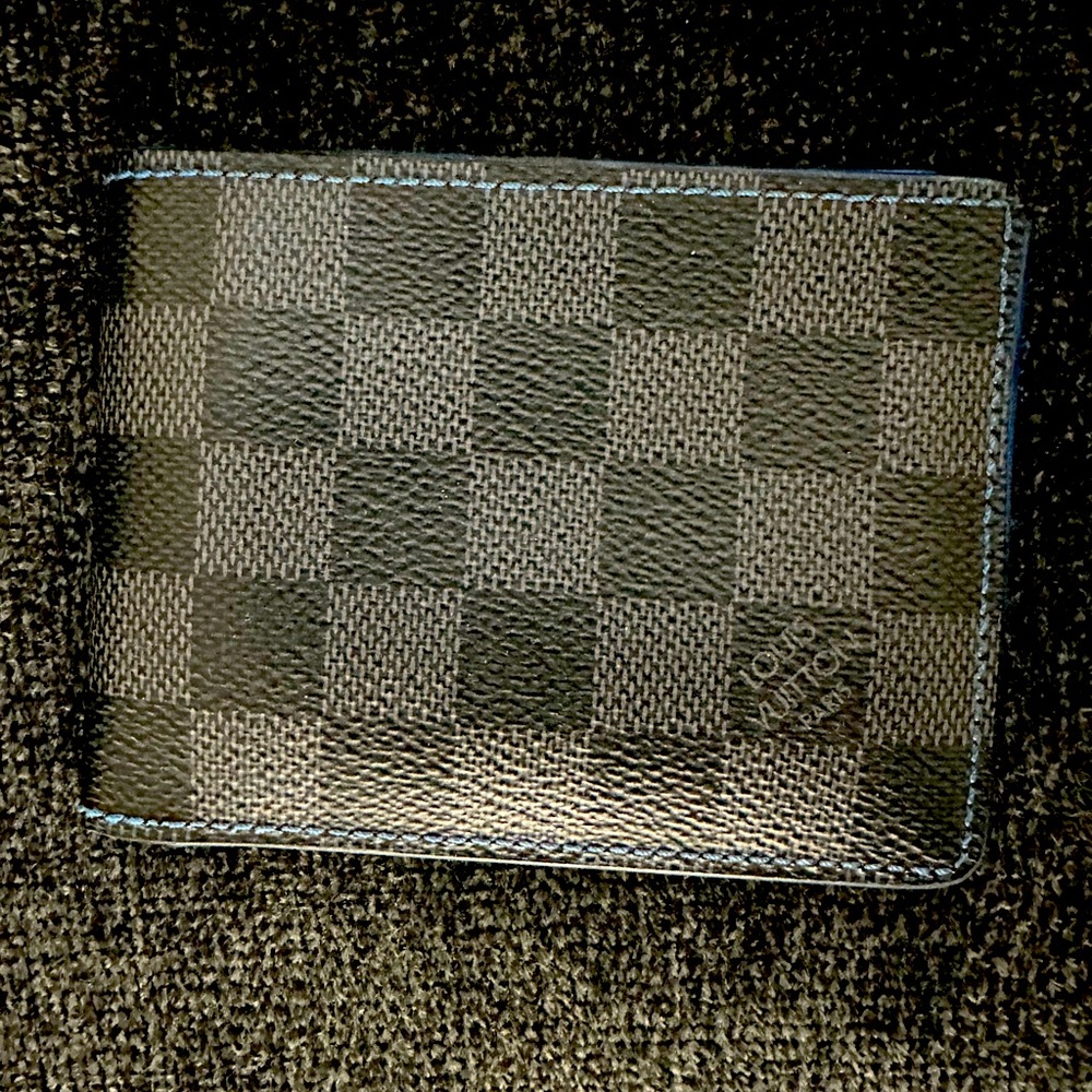 Blue and black Louis Vuitton men’s wallet